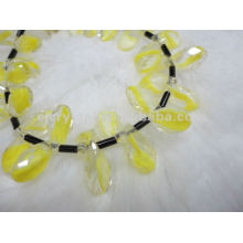 Fabricant de perles de verre jaune